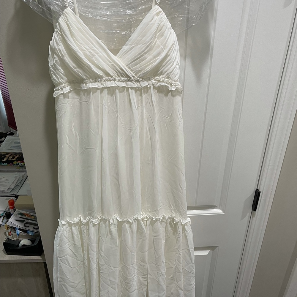 Bridal dress off white in color w/ beading detail